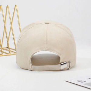 Rear view of beige cotton baseball cap featuring an adjustable silver metal buckle
