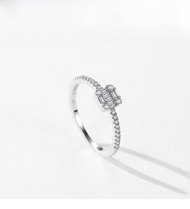 Close-up of S925 sterling silver stamp and sparkling cubic zirconia cluster on ring