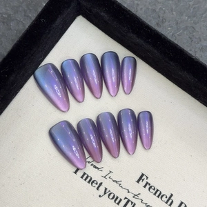 Kit de 10 faux ongles faits main forme amande longue avec effet œil de chat bleu