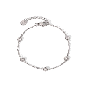 Detailed view of silver stainless steel chain bracelet with five bezel-set cubic zirconia