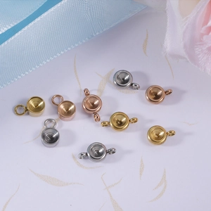 Polished stainless steel round pendant trays in gold, silver, and rose gold finishes