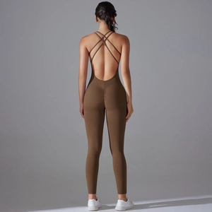 Macro detail of coffee brown ruched butt yoga jumpsuit with crossover straps and open back
