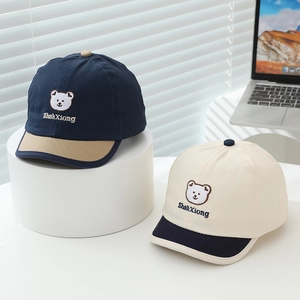 Infant bear patch baseball cap in navy and cream cotton with soft brim and embroidery