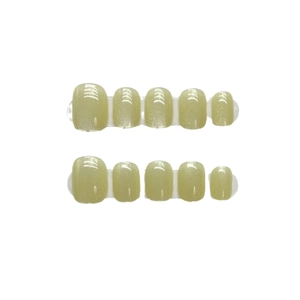 Short mustard green cat eye press-on toenails with rainbow laser glitter effect