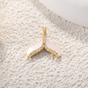 Luxurious whale tail pendant with gold plating, white mother of pearl and zircons