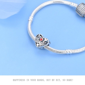 925 silver heart charm with MOM engraving and red heart on a snake bone chain bracelet