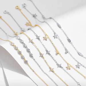 Sparkling S925 sterling silver bracelets with star and clover charms in gold and silver