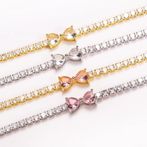 Detailed view of tennis bracelets with sparkling heart-shaped cubic zirconia in various colors