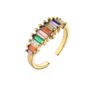 Macro shot of 18K gold plated ring with rainbow cubic zirconia in a gradient setting