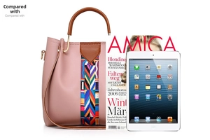 Pink fashion handbag size comparison with tablet and magazine for scale and detail