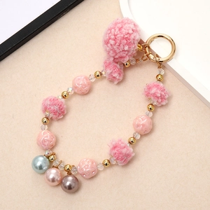 Colorful beaded keychain with pink pompom and pearls for bag decoration