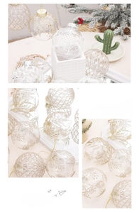 Detail of 8cm transparent Christmas balls with gold glitter patterns and hanging hooks