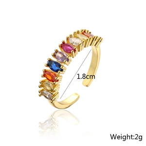Macro detail of 18K gold plated ring featuring colorful zircons, 1.8cm diameter, 2g weight