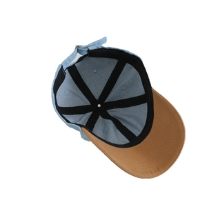 Kids denim baseball cap in blue and brown with adjustable strap and red heart embroidery