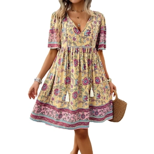 Women's yellow V-neck dress with pink floral print and tassel hem for summer vacation