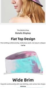 Detail view of tie-dye bucket hat featuring flat top design and wide protective brim