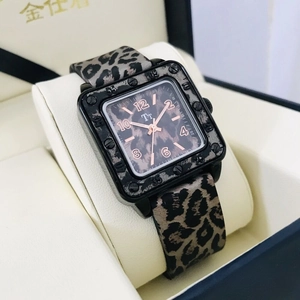 Detail view of square quartz watch with leopard print dial and rose gold indices
