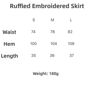 Detailed size chart for embroidered mini skirt showing waist and length in S M L
