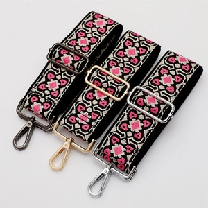 Ethnic bohemian pink and black wide crossbody bag strap with adjustable metal hardware