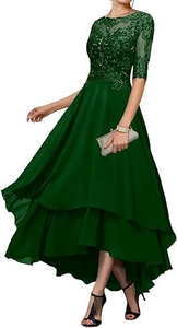 Detail of dark green evening gown featuring lace embroidery and high-low chiffon skirt