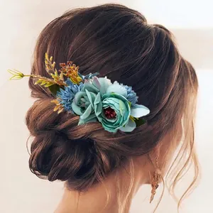 Bohemian bridal hair comb with blue faux flowers, gold leaves and berries for hair styling