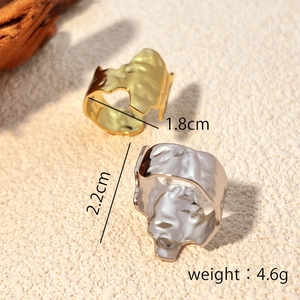 Irregular textured stainless steel rings in gold and silver finish with size specs
