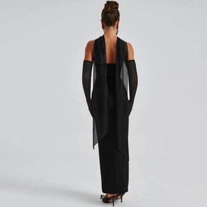 Elegant black strapless evening dress with sheer mesh sleeve gloves and backless detail
