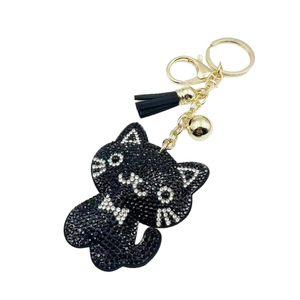 Sparkling black rhinestone cat keychain with golden bell and fringe tassel ornament