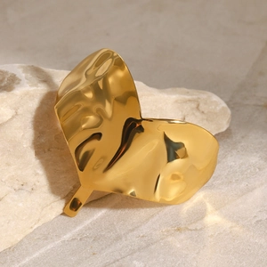 Hammered golden heart hair pin accessory with minimalist metal texture for ponytail styling