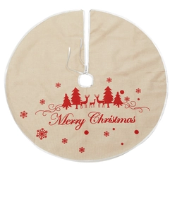 Detail view of burlap Christmas tree skirt with red Merry Christmas print and white ties