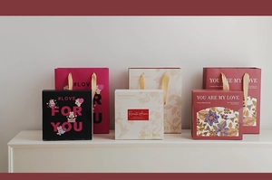 Elegant gift box and matching paper bag set in black, cream, and burgundy colors