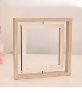 Close-up of a double-sided rotating wooden photo frame with natural wood grain texture