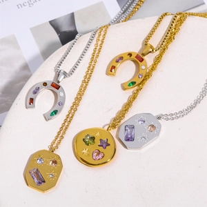 Collection of horseshoe and round gold-plated necklaces featuring colorful zircon stones