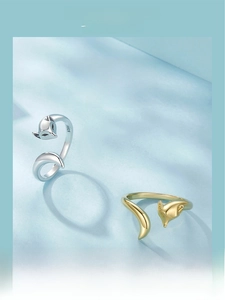 Close-up of S925 sterling silver fox ring showing fox head and tail detail with engraving