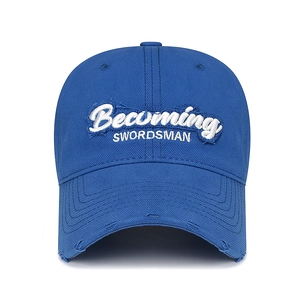 Distressed navy blue baseball cap with white Becoming Swordsman embroidery on cotton fabric