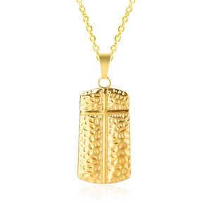Close-up of golden rectangular pendant with hammer texture and cross design on necklace