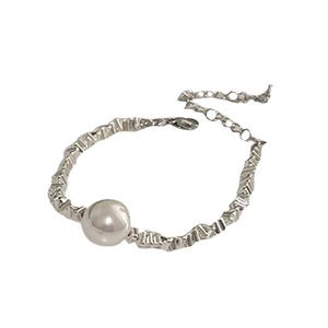 Minimalist irregular silver textured chain necklace with a central large white round pearl