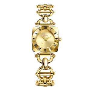 Detailed close-up of a vintage gold women's watch with square dial and Roman numerals