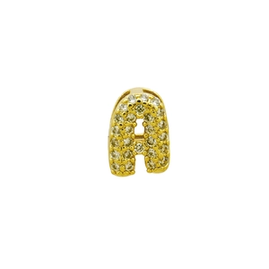 Macro shot of bubble letter A gold pendant with micro-paved sparkling cubic zirconia