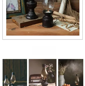 Dettagli di un portacandele vintage in resina a forma di lampada a petrolio retrò
