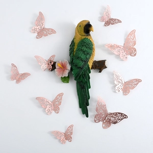 3D hollow paper butterflies and colorful parrot sculpture on a minimalist white wall