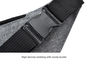 Detail of durable black buckle with high-density webbing on gray sports waist bag
