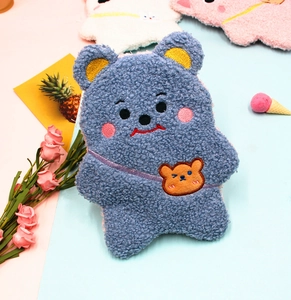 Close-up of cute blue teddy bear plush pencil case with detailed computer embroidery