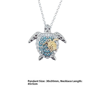 Detail view of sea turtle pendant with blue enamel, measuring 30x30mm on a 45cm chain