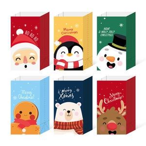 Set of 6 Christmas paper gift bags with Santa and reindeer festive designs