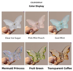 Color display of six butterfly hair claws in frosted and transparent finishes