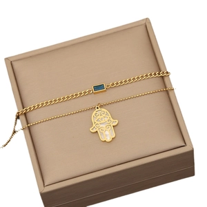 Doppellagige Gold-Edelstahlkette mit blauem Edelstein und Hamsa-Hand-Anhänger