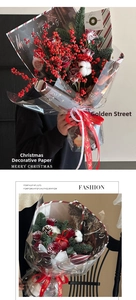 Detail of Christmas apple bouquet wrapping paper with festive red berries and ribbons