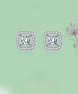 Macro view of square halo stud earrings with s925 silver and brilliant cubic zirconia