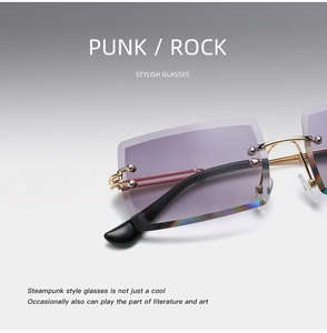 Detail of purple gradient frameless lens with golden metal hinge for steampunk sunglasses